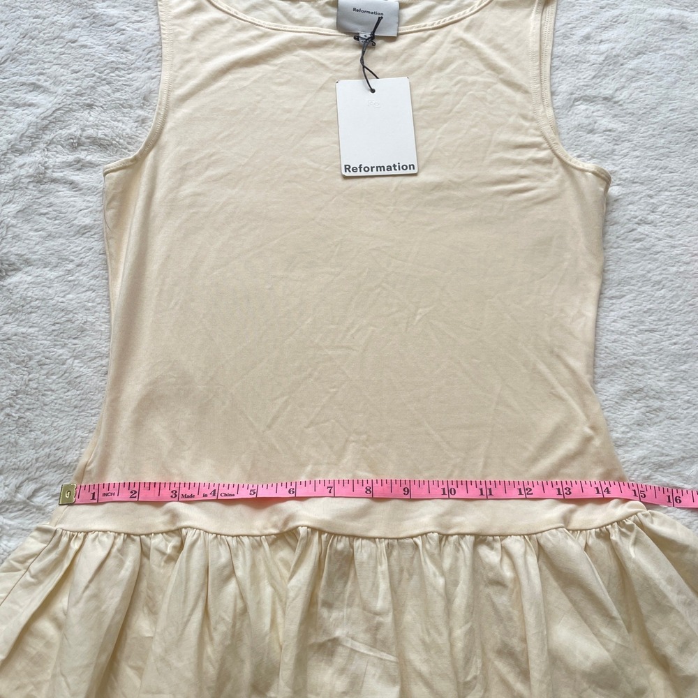 Sleeveless Cream Ruffle-Hem Mini Dress - Picture 8 of 11